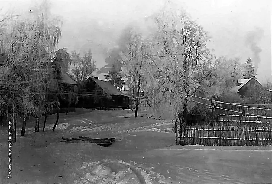 Houses and a snow-covered street in Gostilizy, 1941.