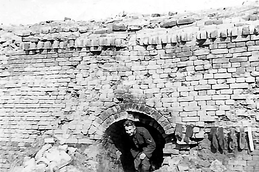 Soldier Alex Heck at the entrance to the battalion command post in a historic fortress on the Neva Front.